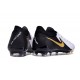 Scarpe Nike Phantom GX 2 Elite FG Bianco Nero Oro Metallizzato